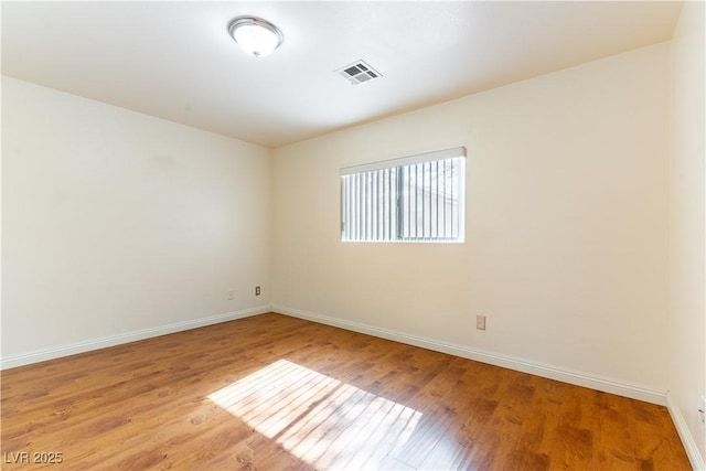 7923 Homer Ct, Las Vegas, NV 89139 - unfurnished room featuring baseboards and light wood-type flooring