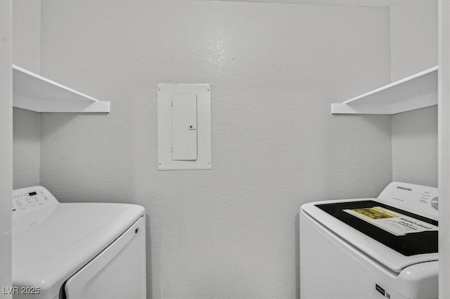 230 Mission Newport Ln Unit 104, Las Vegas, NV 89107 - washroom with electric panel and washing machine and clothes dryer