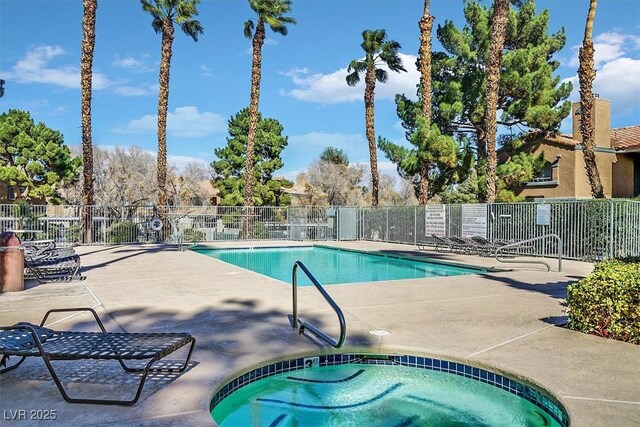 230 Mission Newport Ln Unit 104, Las Vegas, NV 89107 - community pool featuring a community hot tub and a patio area