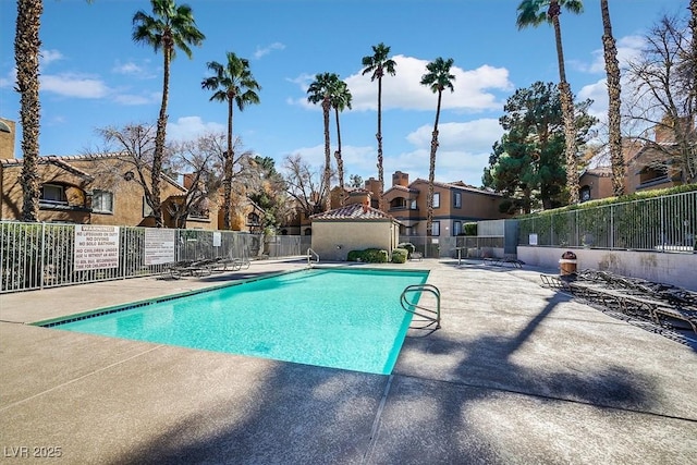 230 Mission Newport Ln Unit 104, Las Vegas, NV 89107 - community pool featuring a patio area and a residential view