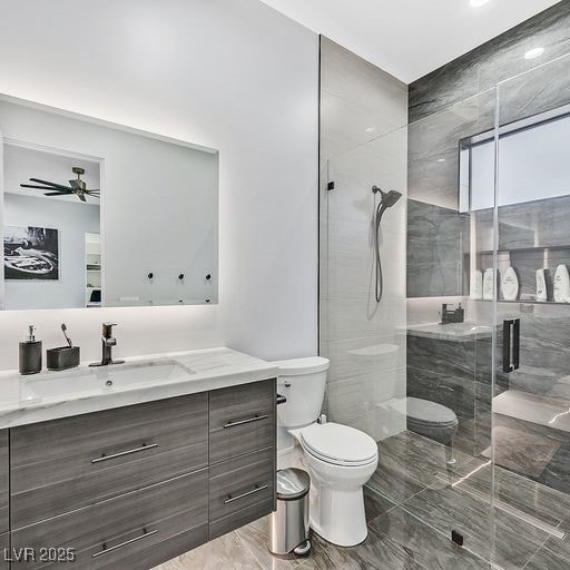 5400 Mello Ave, Las Vegas, NV 89131 - full bathroom with vanity, a stall shower, and ceiling fan