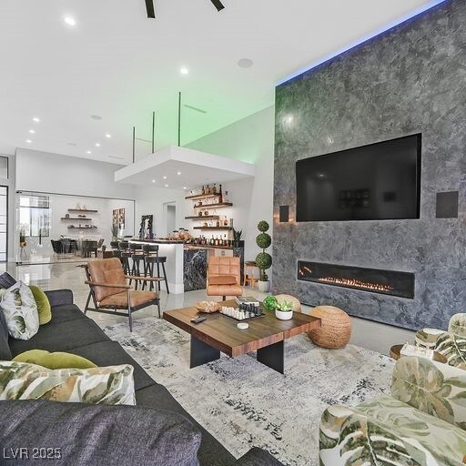 5400 Mello Ave, Las Vegas, NV 89131 - living area with a large fireplace and recessed lighting