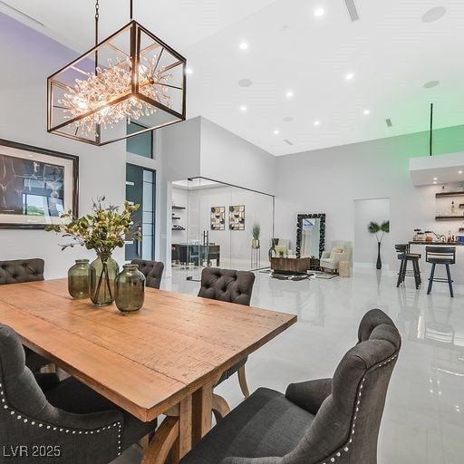 5400 Mello Ave, Las Vegas, NV 89131 - dining room with a towering ceiling, recessed lighting, and a chandelier