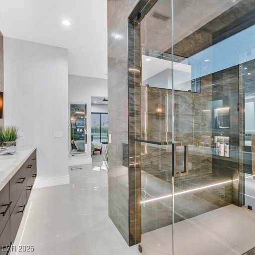 5400 Mello Ave, Las Vegas, NV 89131 - bathroom featuring vanity, a stall shower, tile patterned floors, and recessed lighting