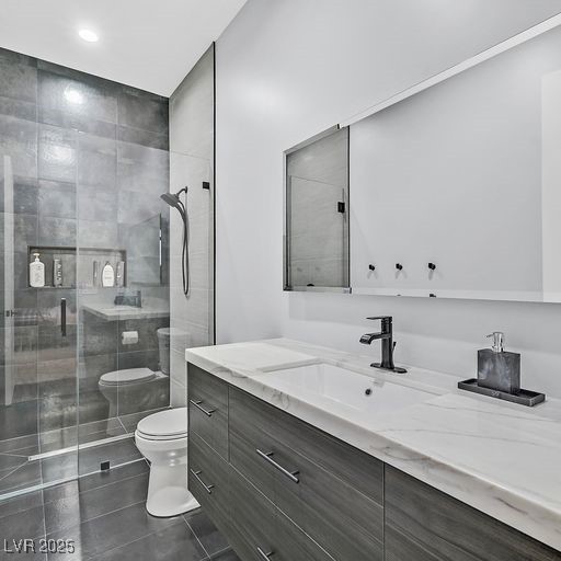 5400 Mello Ave, Las Vegas, NV 89131 - full bathroom featuring vanity, a shower stall, and tile patterned floors