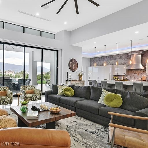 5400 Mello Ave, Las Vegas, NV 89131 - living room with ceiling fan, recessed lighting, and a high ceiling