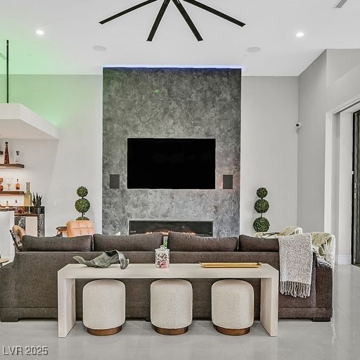 5400 Mello Ave, Las Vegas, NV 89131 - living room featuring a high end fireplace and recessed lighting