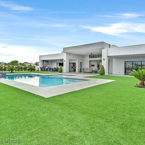 5400 Mello Ave, Las Vegas, NV 89131 - swimming pool featuring a patio area and a yard