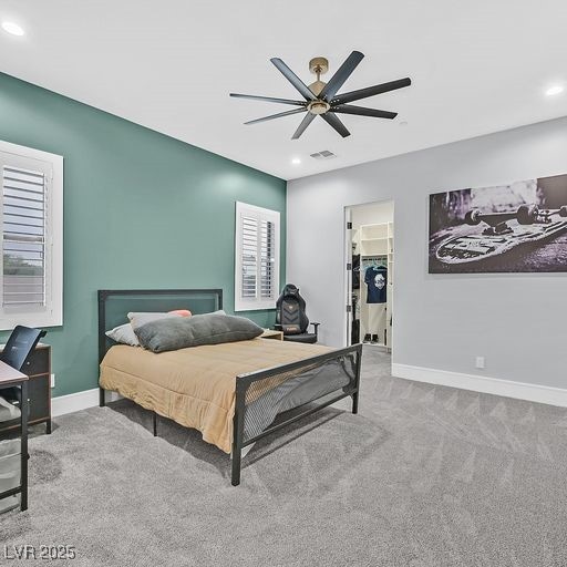 5400 Mello Ave, Las Vegas, NV 89131 - bedroom with a walk in closet, recessed lighting, ceiling fan, carpet flooring, and a closet