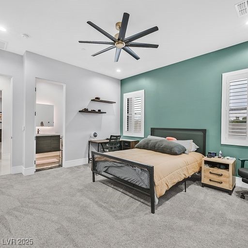 5400 Mello Ave, Las Vegas, NV 89131 - bedroom with carpet floors, a ceiling fan, recessed lighting, and ensuite bathroom