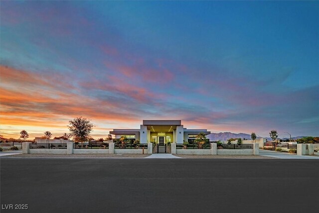 5400 Mello Ave, Las Vegas, NV 89131 - contemporary home with a fenced front yard, a gate, and stucco siding