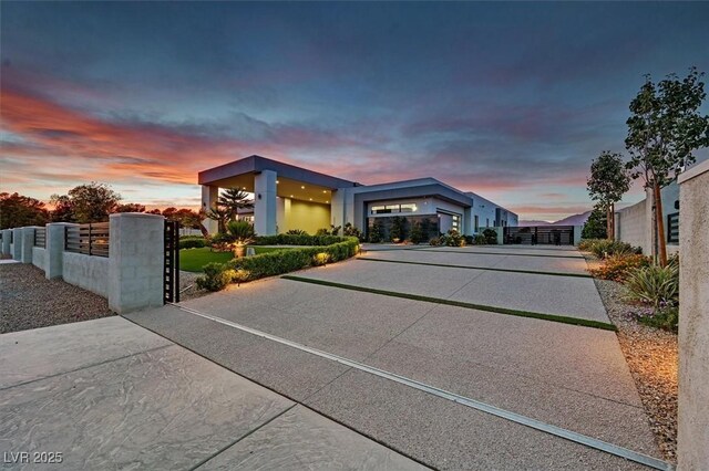 5400 Mello Ave, Las Vegas, NV 89131 - view of front of house featuring stucco siding and a gate