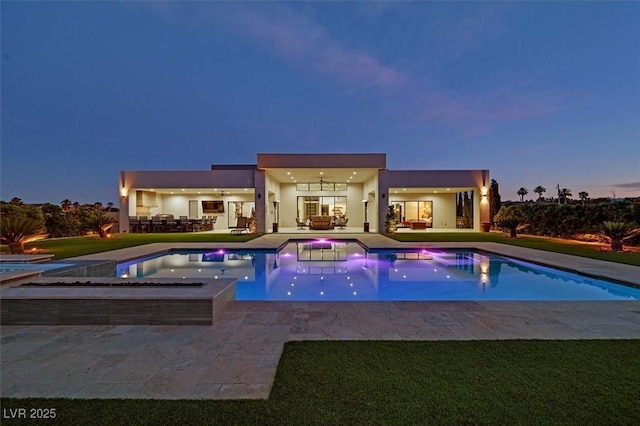 5400 Mello Ave, Las Vegas, NV 89131 - outdoor pool with an in-ground hot tub, a patio area, ceiling fan, and an outdoor living space