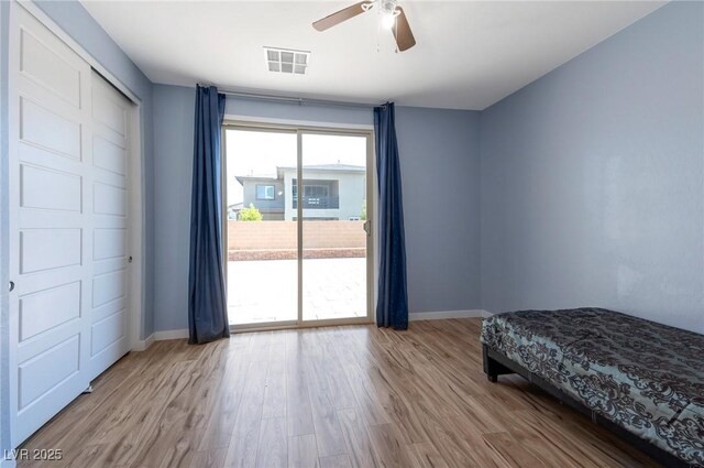 754 Tallgrass St, Las Vegas, NV 89138 - bedroom featuring access to outside, wood finished floors, baseboards, and ceiling fan