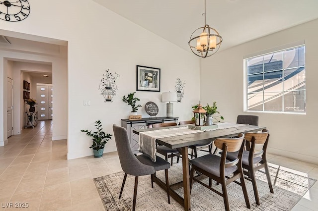 130 W Fairway Rd, Henderson, NV 89015 - dining room featuring a chandelier, light tile patterned floors, baseboards, and vaulted ceiling