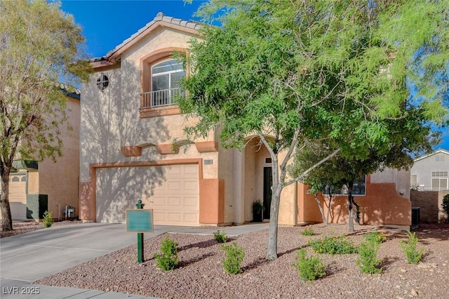 10988 Salernes St, Las Vegas, NV 89141 - view of front of property featuring stucco siding, driveway, an attached garage, and a tile roof