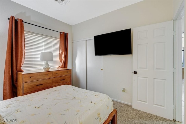 10988 Salernes St, Las Vegas, NV 89141 - bedroom featuring light carpet, a closet, and baseboards