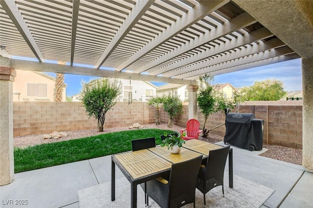 10988 Salernes St, Las Vegas, NV 89141 - fenced backyard featuring outdoor dining space, grilling area, a patio, and a pergola