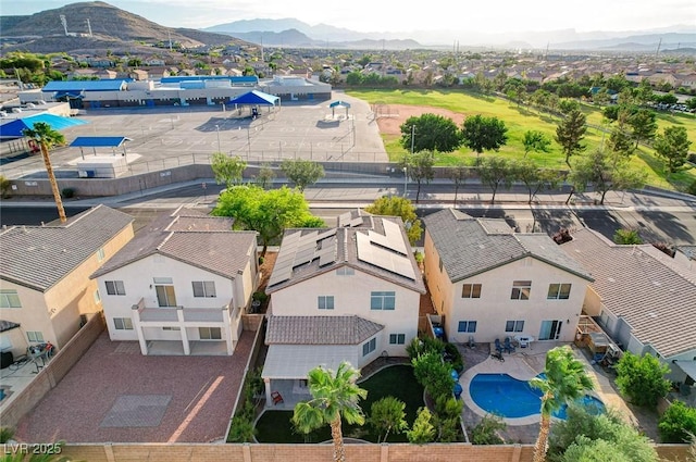 10988 Salernes St, Las Vegas, NV 89141 - aerial view of residential area with a mountainous background and a pool area