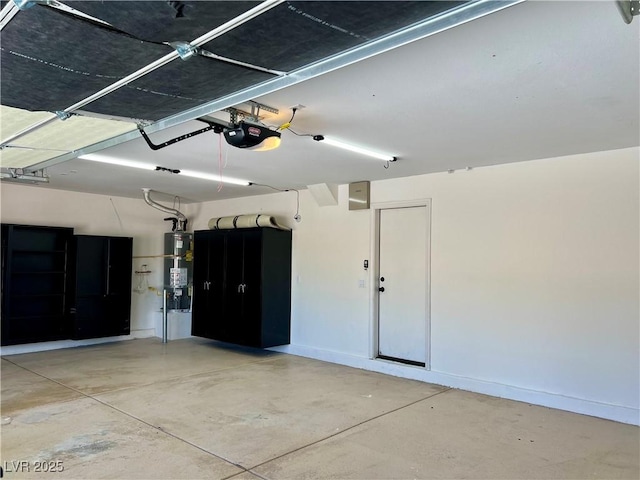 1921 Moonlight Bluff Ave, North Las Vegas, NV 89084 - garage with a garage door opener and strapped water heater