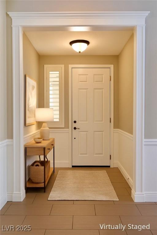 1921 Moonlight Bluff Ave, North Las Vegas, NV 89084 - entrance foyer featuring tile patterned flooring
