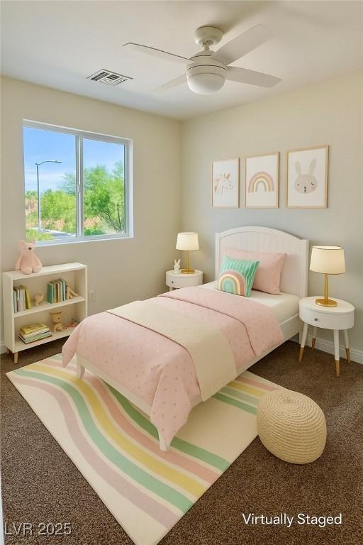1921 Moonlight Bluff Ave, North Las Vegas, NV 89084 - carpeted bedroom with ceiling fan