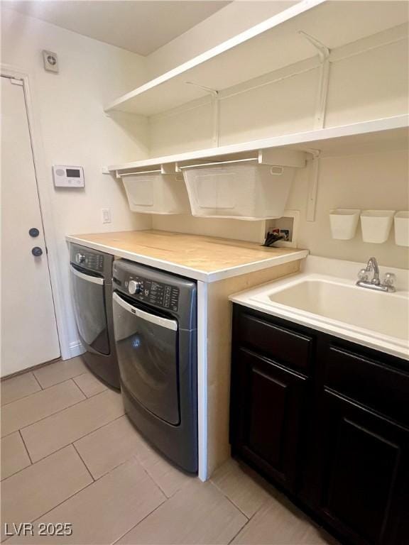 1921 Moonlight Bluff Ave, North Las Vegas, NV 89084 - washroom with washer hookup and light tile patterned flooring