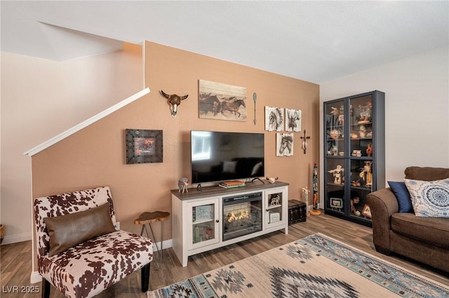 12348 Golden Wreath Rd Unit 1, Las Vegas, NV 89183 - living room featuring wood finished floors and baseboards