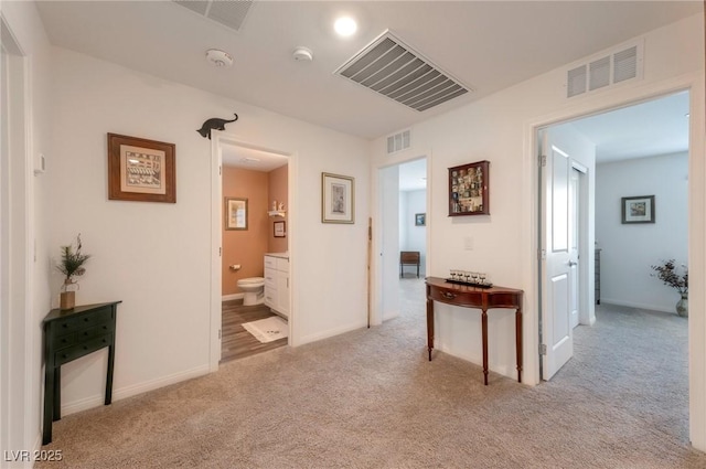 12348 Golden Wreath Rd Unit 1, Las Vegas, NV 89183 - hallway with carpet floors and baseboards