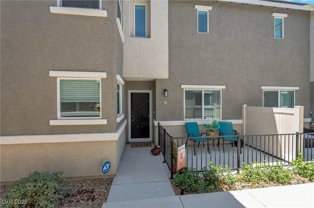 12348 Golden Wreath Rd Unit 1, Las Vegas, NV 89183 - doorway to property with stucco siding