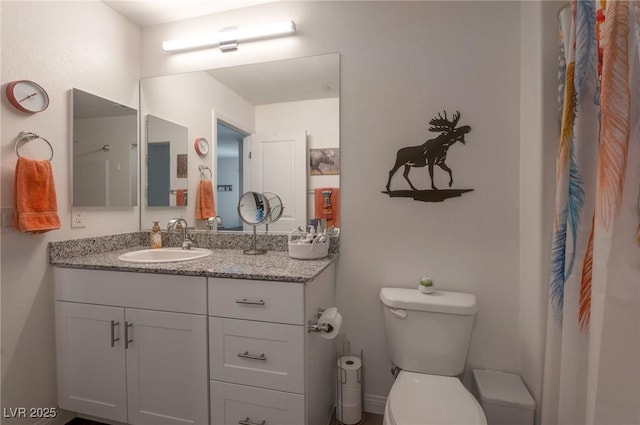 12348 Golden Wreath Rd Unit 1, Las Vegas, NV 89183 - full bath featuring vanity, toilet, and a shower with curtain