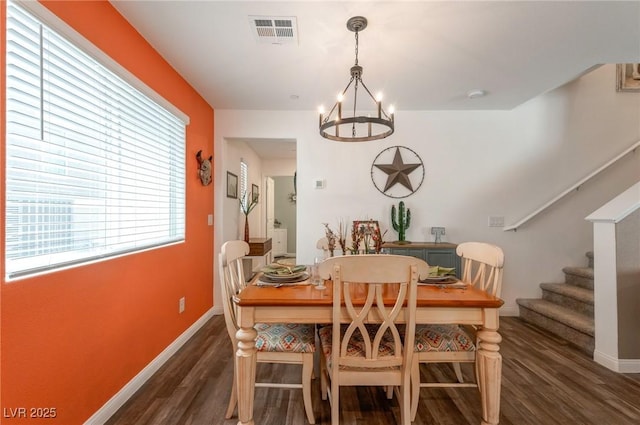 12348 Golden Wreath Rd Unit 1, Las Vegas, NV 89183 - dining space featuring dark wood finished floors, stairs, a chandelier, and baseboards