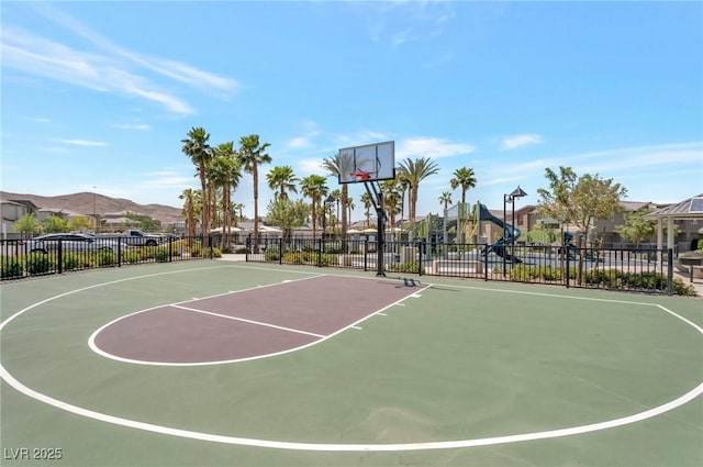 12348 Golden Wreath Rd Unit 1, Las Vegas, NV 89183 - view of basketball court featuring community basketball court, a residential view, and a mountain view