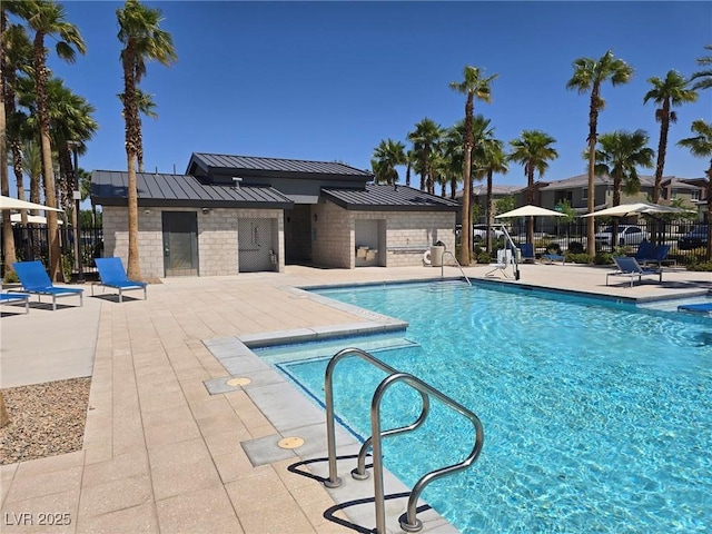 12348 Golden Wreath Rd Unit 1, Las Vegas, NV 89183 - community pool with a patio area