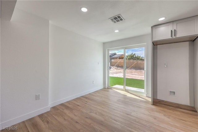 5200 Blanton Dr, Las Vegas, NV 89122 - unfurnished room with light wood-type flooring, baseboards, and recessed lighting