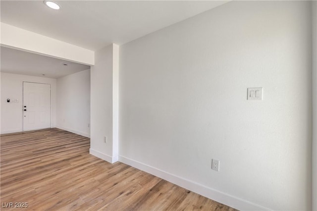 5200 Blanton Dr, Las Vegas, NV 89122 - empty room featuring light wood-style floors, baseboards, and recessed lighting