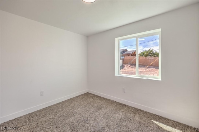 5200 Blanton Dr, Las Vegas, NV 89122 - carpeted empty room featuring baseboards