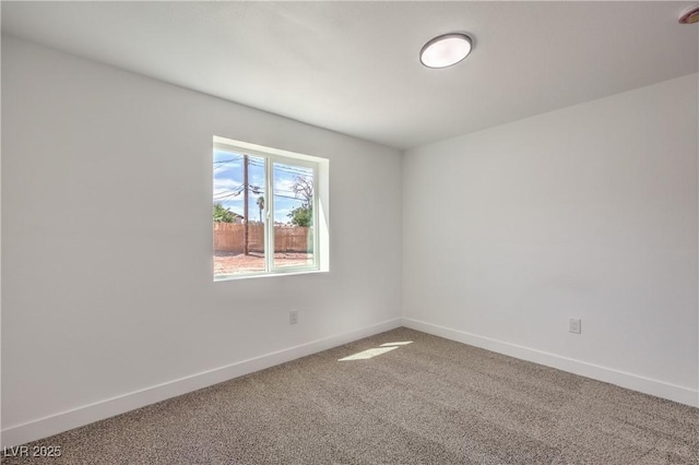 5200 Blanton Dr, Las Vegas, NV 89122 - carpeted empty room featuring baseboards