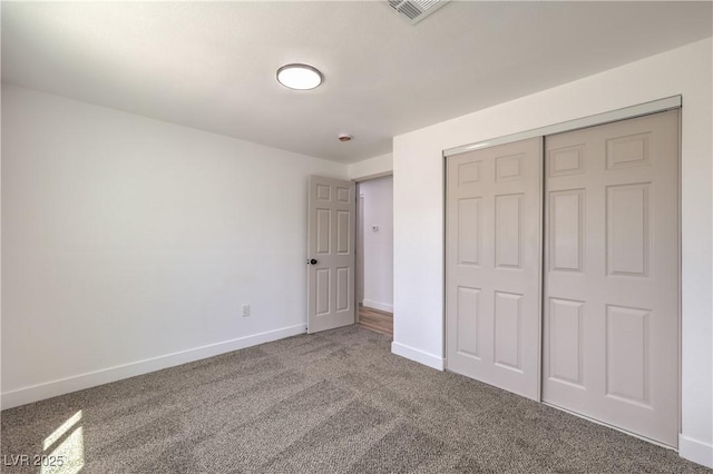 5200 Blanton Dr, Las Vegas, NV 89122 - unfurnished bedroom featuring carpet flooring, baseboards, and a closet