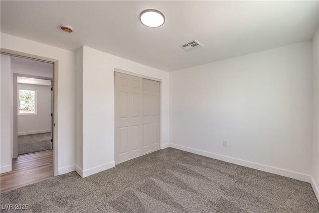 5200 Blanton Dr, Las Vegas, NV 89122 - unfurnished bedroom with carpet floors, baseboards, and a closet