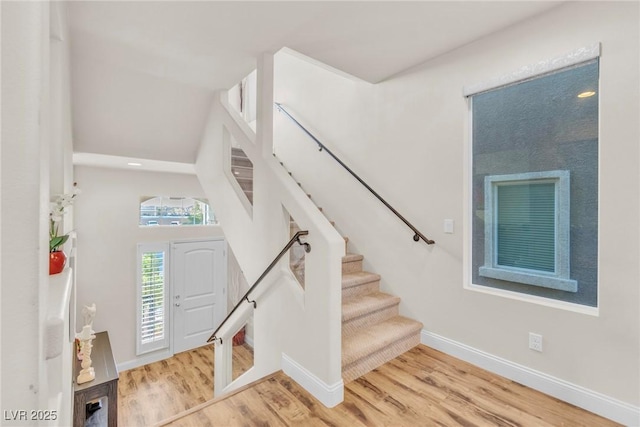 5889 Thistle Meadow Ave, Las Vegas, NV 89139 - foyer entrance with light wood finished floors and stairs