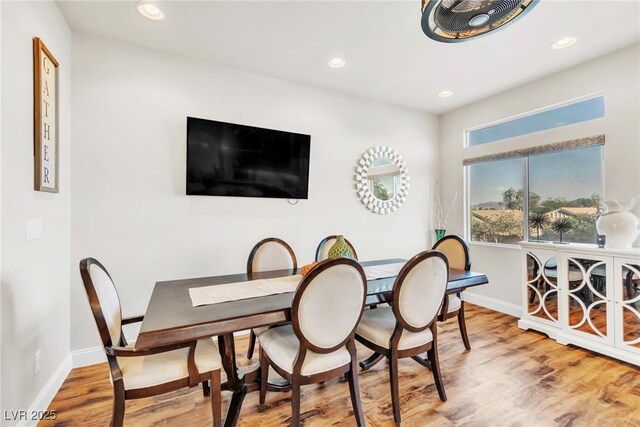 5889 Thistle Meadow Ave, Las Vegas, NV 89139 - dining room featuring light wood-style floors and recessed lighting