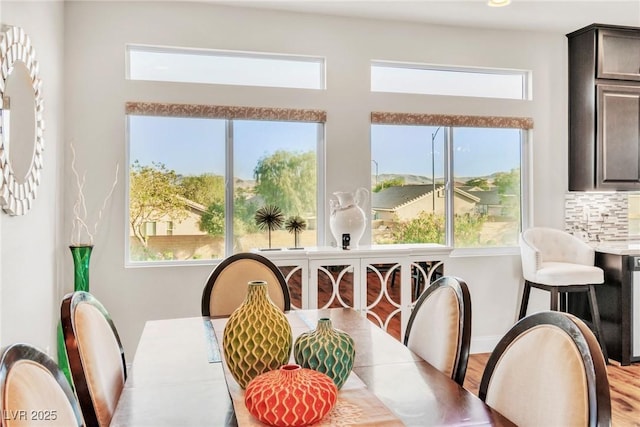 5889 Thistle Meadow Ave, Las Vegas, NV 89139 - dining room with wood finished floors and baseboards