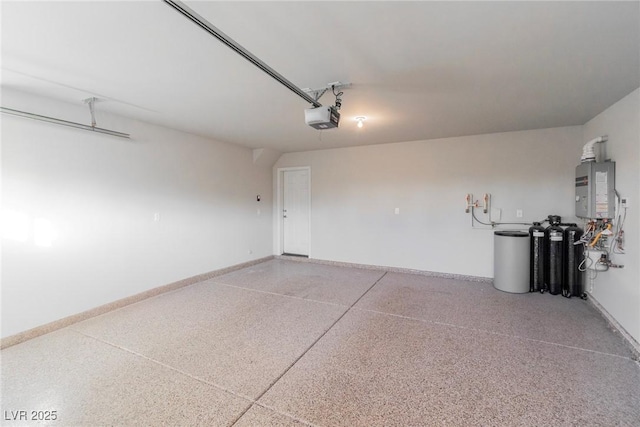 5889 Thistle Meadow Ave, Las Vegas, NV 89139 - garage with a garage door opener and water heater