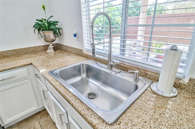 10667 Olympic Pine Dr, Las Vegas, NV 89135 - kitchen view of a sink and white cabinets