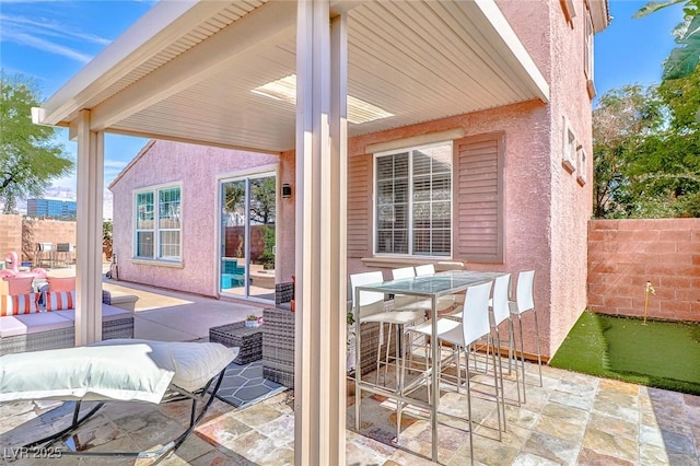 10667 Olympic Pine Dr, Las Vegas, NV 89135 - view of patio / terrace featuring outdoor lounge area