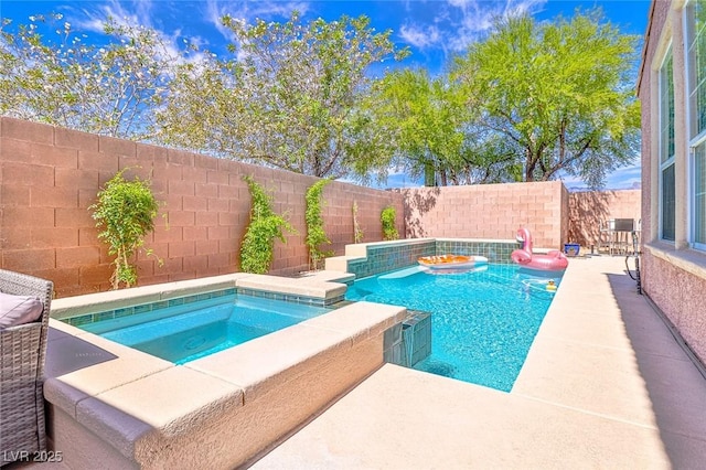 10667 Olympic Pine Dr, Las Vegas, NV 89135 - view of swimming pool featuring an in-ground hot tub and a fenced backyard