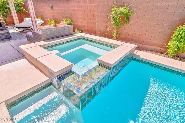 10667 Olympic Pine Dr, Las Vegas, NV 89135 - view of pool featuring an in-ground hot tub and a patio