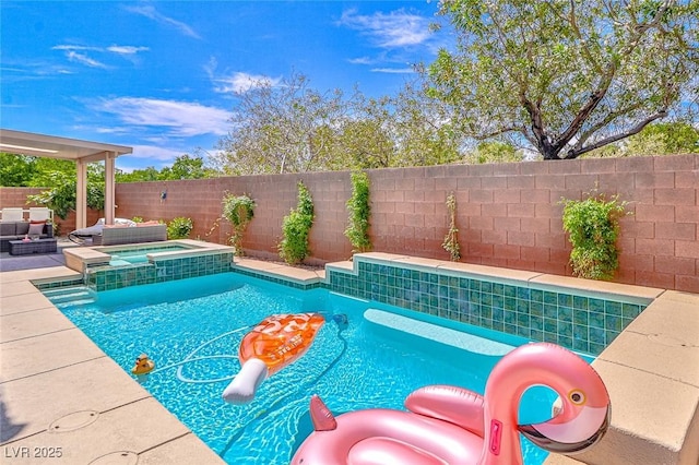 10667 Olympic Pine Dr, Las Vegas, NV 89135 - view of swimming pool with a fenced backyard, a pool with connected hot tub, and a patio