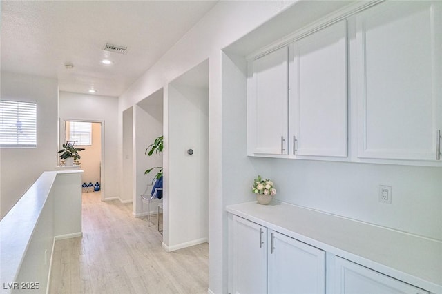 10667 Olympic Pine Dr, Las Vegas, NV 89135 - corridor featuring light wood finished floors, recessed lighting, and baseboards